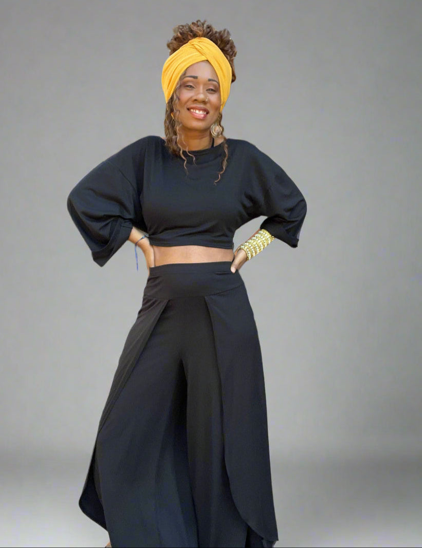 2-piece outfit set with a long cropped top and wide leg pants with high slits.