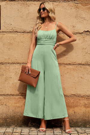 Pastel Green spaghetti strap wide leg jumpsuit with seam detail and cutout tieback