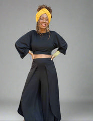 2-piece outfit set with a long cropped top and wide leg pants with high slits.