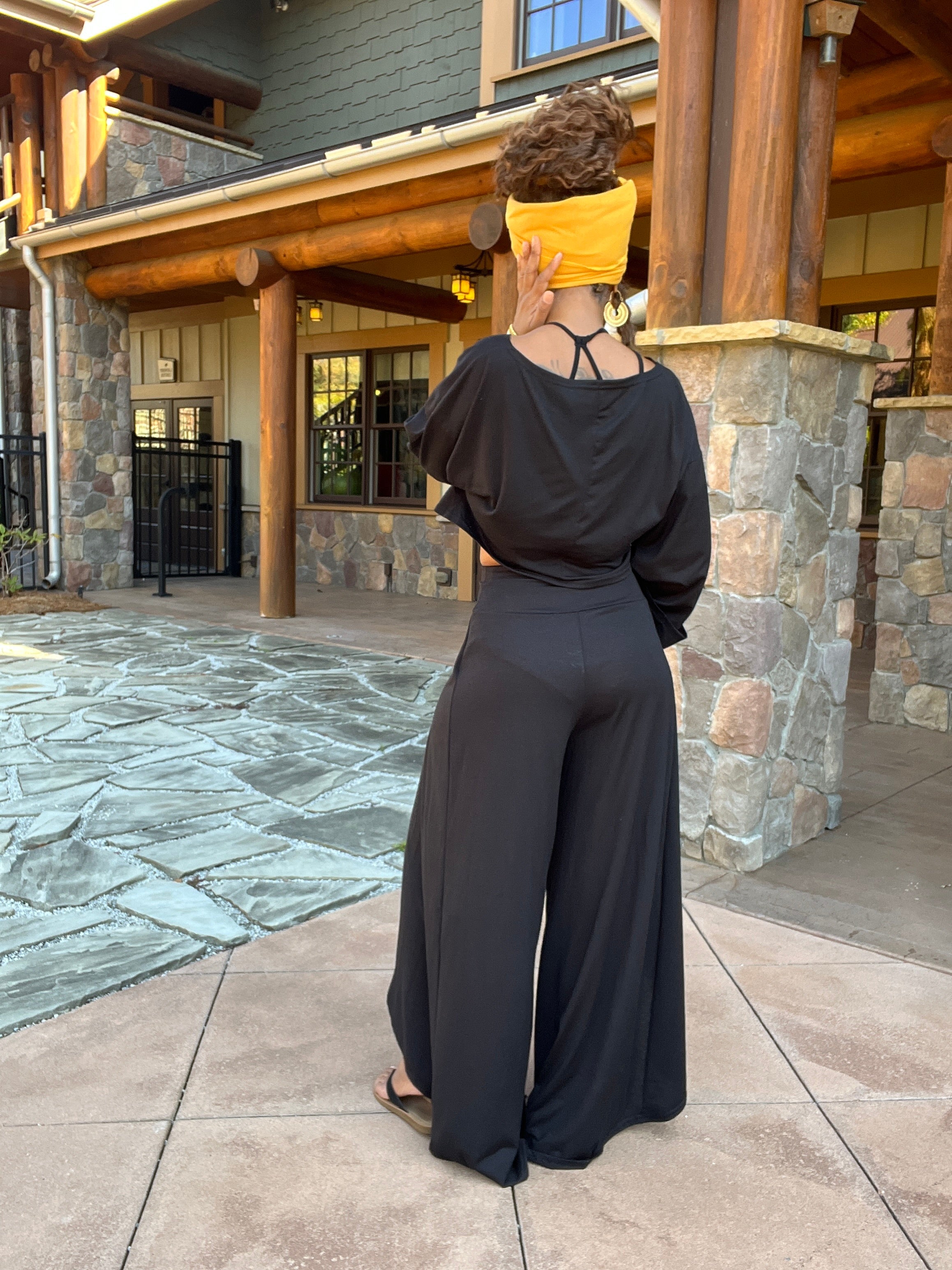 Back view of Brianna 2 piece crop top and wide leg set in black