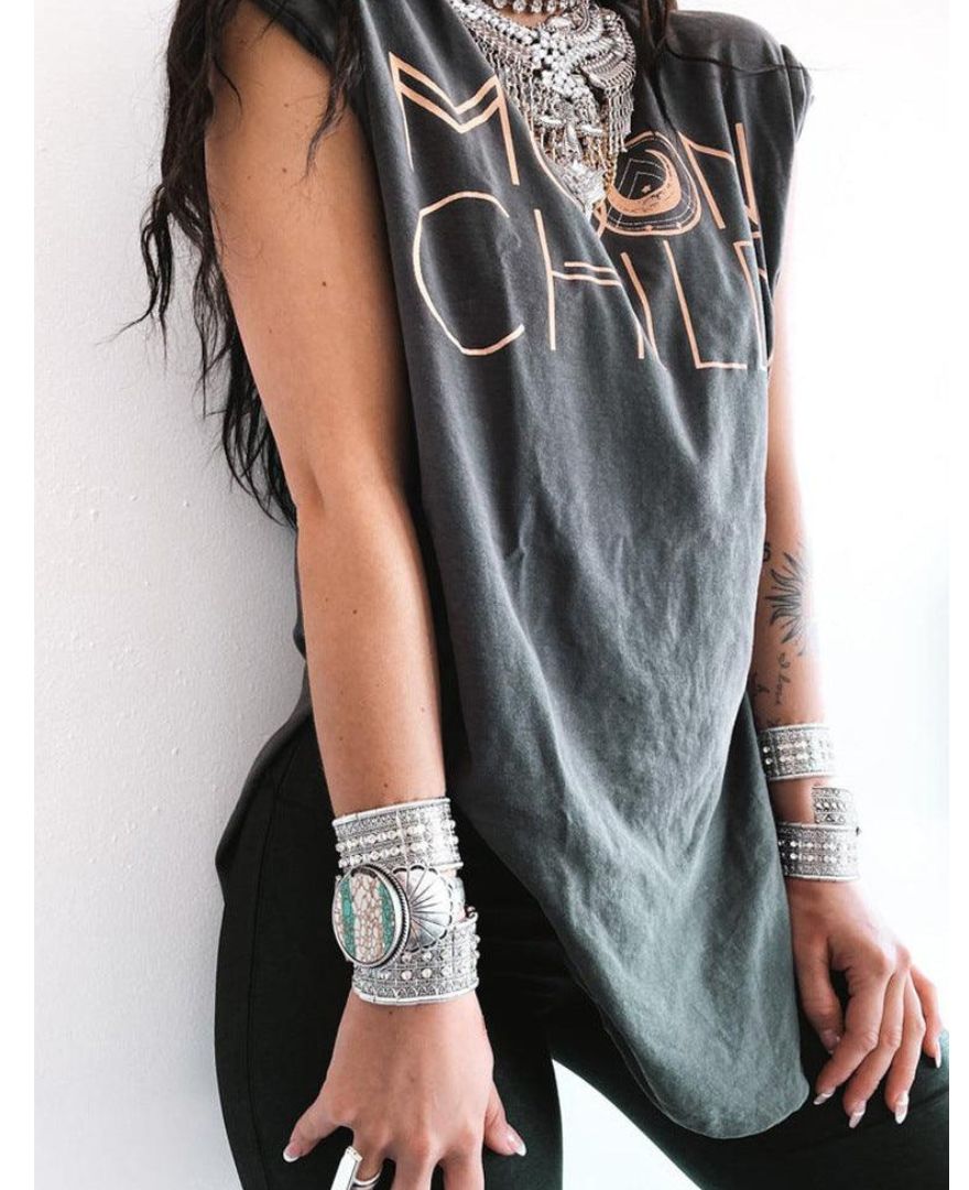 silver bangles and necklace