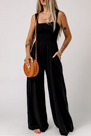 Black smocked sleeveless wide leg jumpsuit with pockets