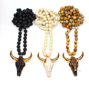 Longhorn Bull Skull Necklace with lava stone beading.