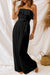 Black ruffled strapless wide leg jumpsuit with tie waist