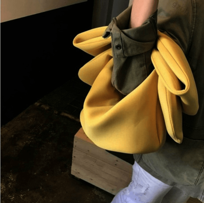 Bow Day Clutch Bag in Yellow