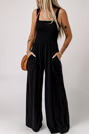 Black smocked sleeveless wide leg jumpsuit with pockets