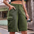 Women's flap pocket cargo button front Bermuda shorts in Tan.