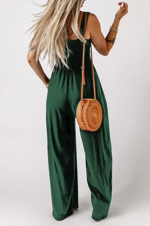 Green smocked sleeveless wide leg jumpsuit with pockets