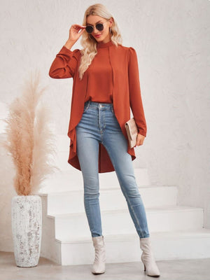 long puff sleeve high-low mock neck blouse brick red