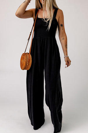 Black smocked sleeveless wide leg jumpsuit with pockets