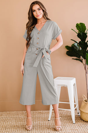 Light gray button front belted cropped jumpsuit with pockets