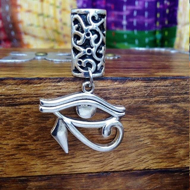 Silver Metal Loc And Braid  With Eye Of Horus Hair Charm Attached.
