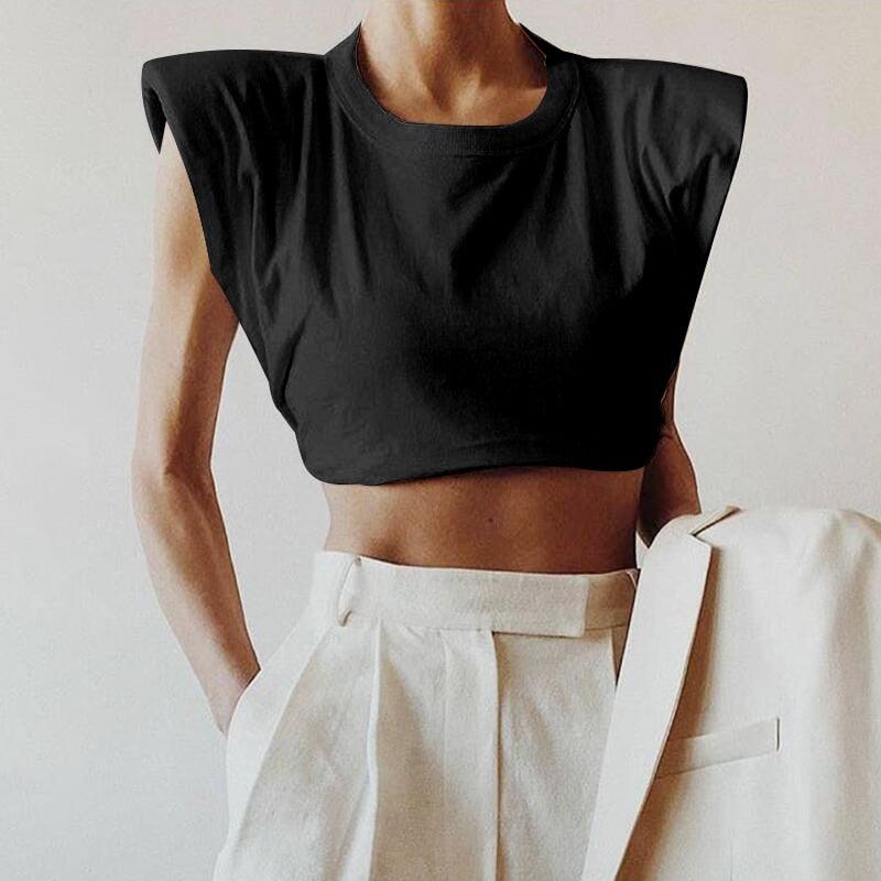 Black crew neck crop top with cap sleeves and shoulder pads. 